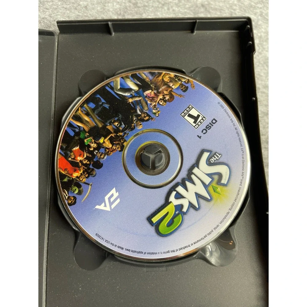 The Sims 2 PC CD-ROM Video Game 4-Disc Set with Manual EA Includes Serial‎ Code